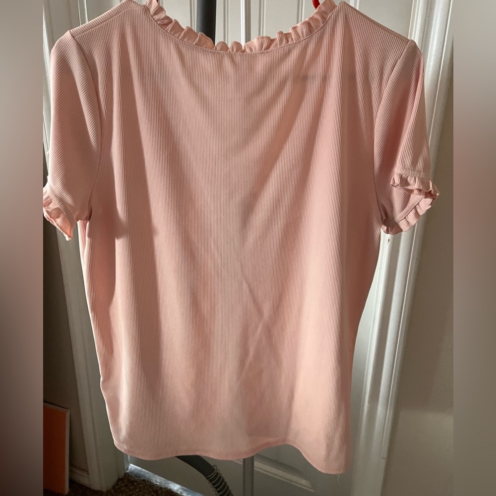 pink button up shirt